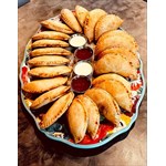 Each tray 25 baked delicious and freshly empanadas